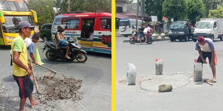 Sejumlah pekerja tengah memperbaiki bekas galian perbaikan pipa di Kota Siantar.